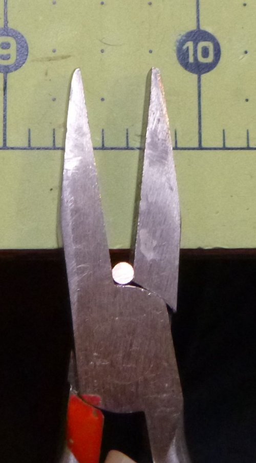 Judy Larson's Squaring Wire Ends - , General Education, , File the wire flat and flush with the top of the pliers.